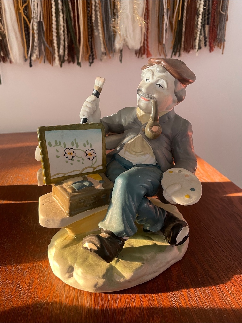 Vintage  ceramic painter statute  in the park figurine